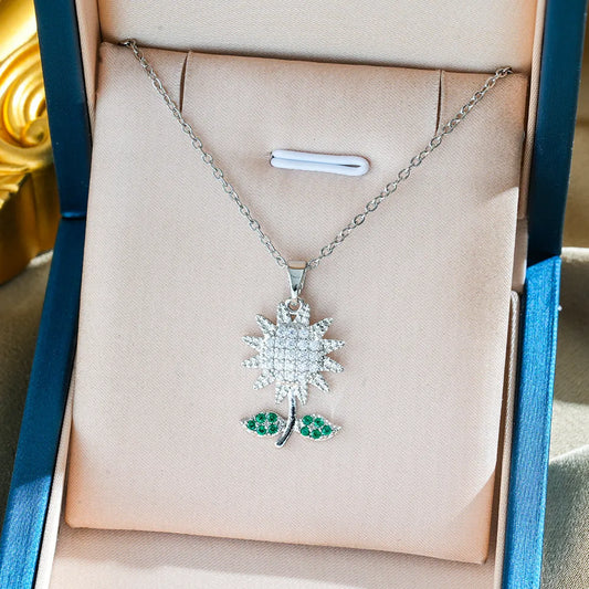Titanium Spin Sunflower Flower Pave Green CZ Pendant