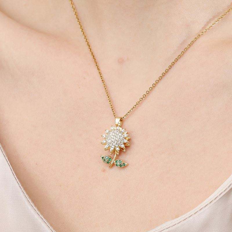 Titanium Spin Sunflower Flower Pave Green CZ Pendant