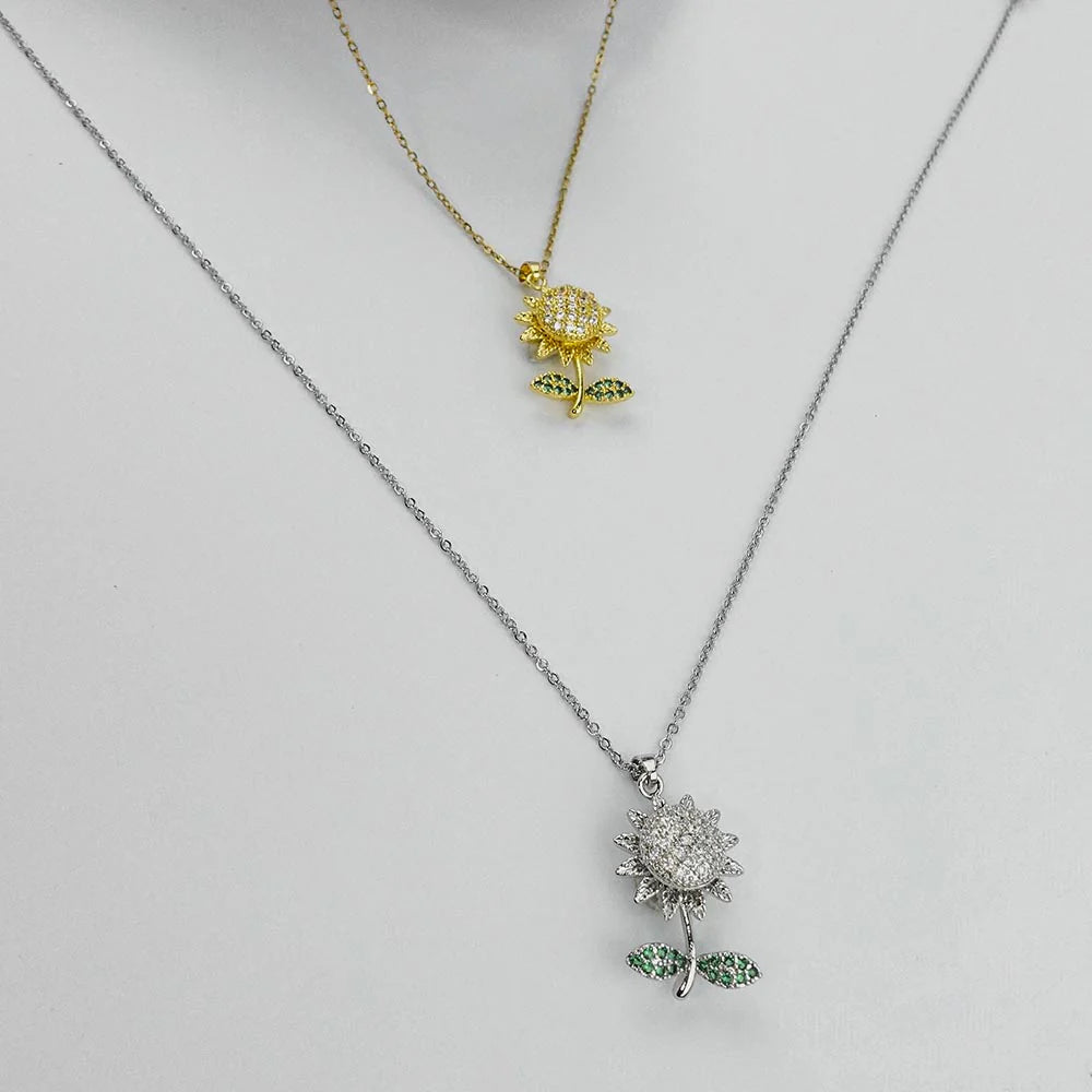 Titanium Spin Sunflower Flower Pave Green CZ Pendant