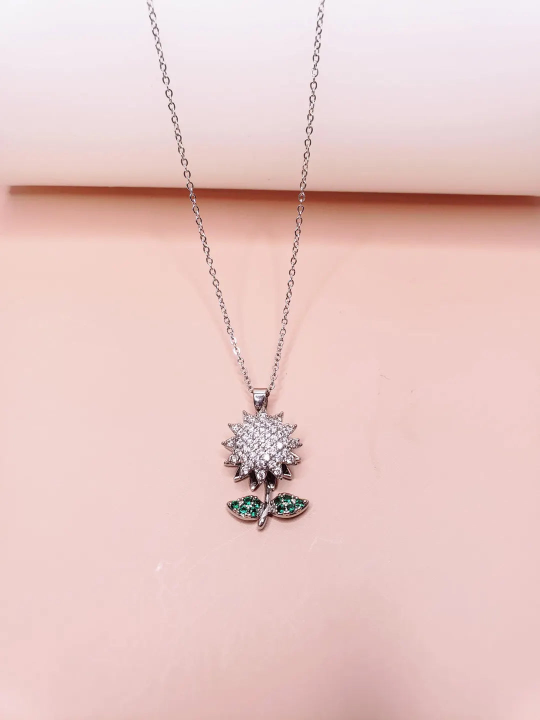Titanium Spin Sunflower Flower Pave Green CZ Pendant